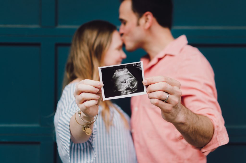 A photo of some new parents and it can also be challenging and overwhelming. Here are some things that many new parents wish they knew before becoming a parent