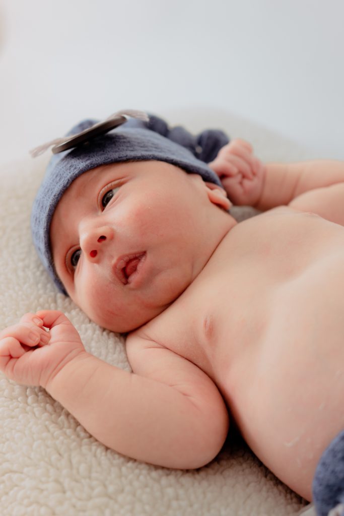 A photo of a newborn baby newborn's first word