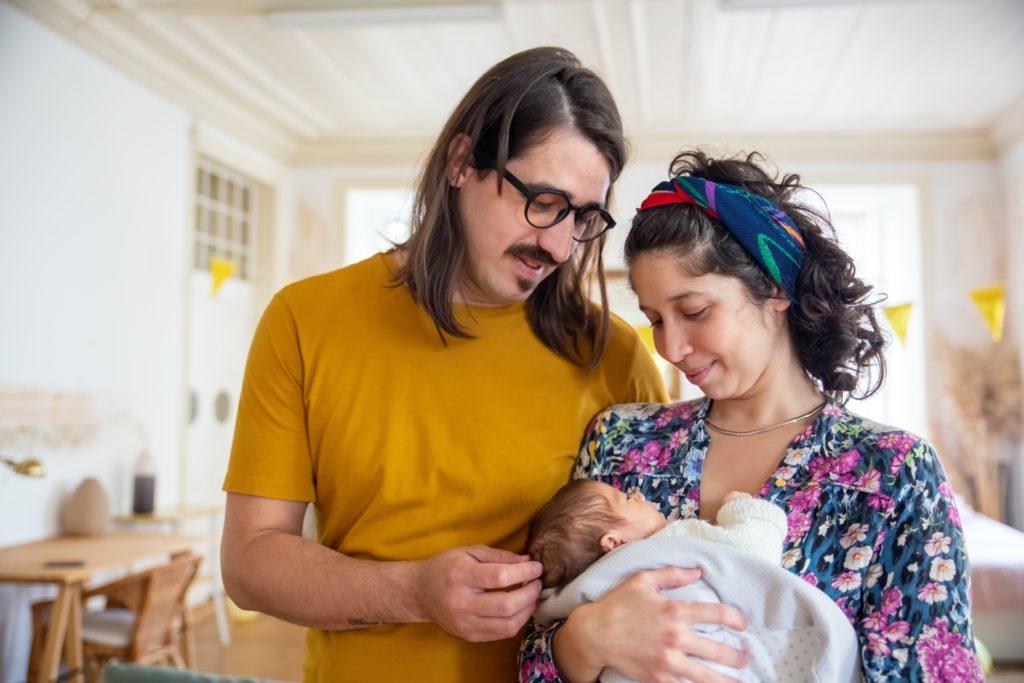 New parents providing care of a newborn