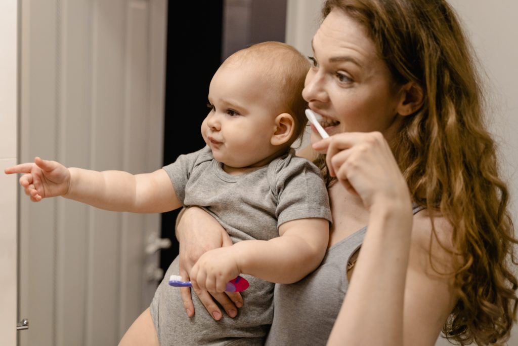Brushing Baby Teeth With mom
