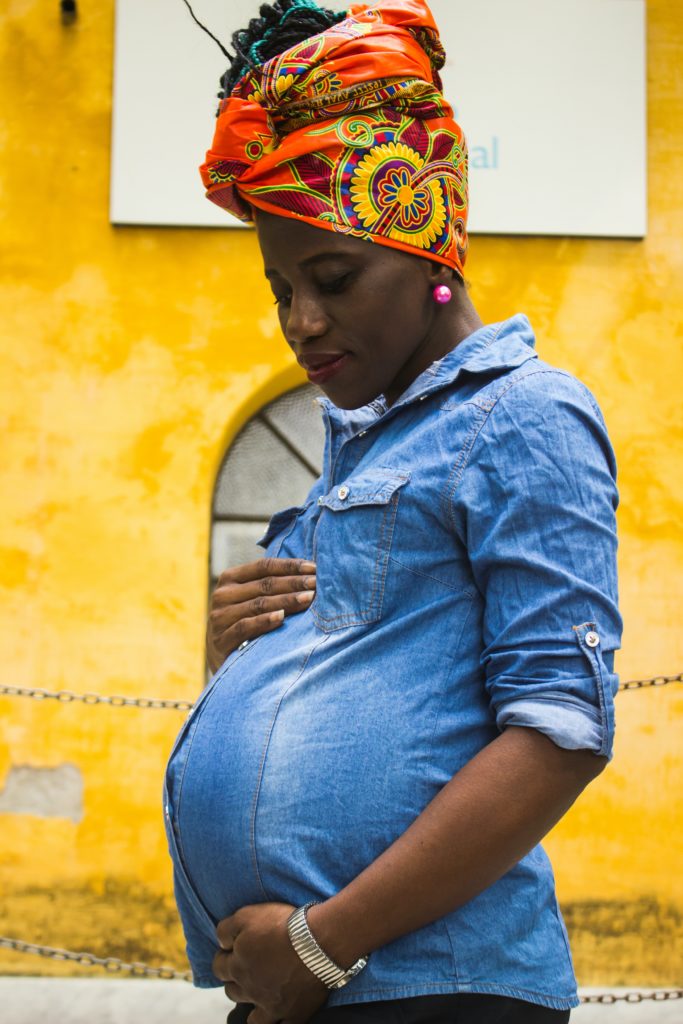 A pregnant woman mindful of what they eat