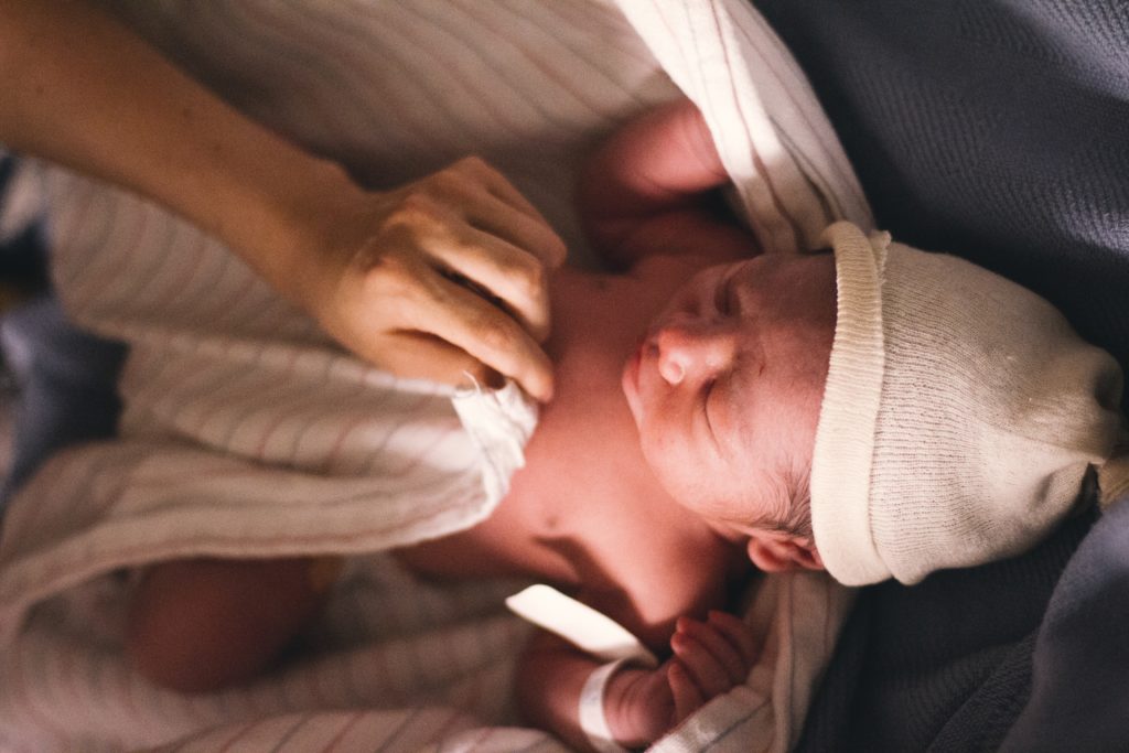 a photo of a newborn baby in an article about newborn development